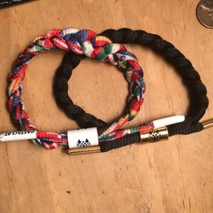 Two rastaclat bracelets.